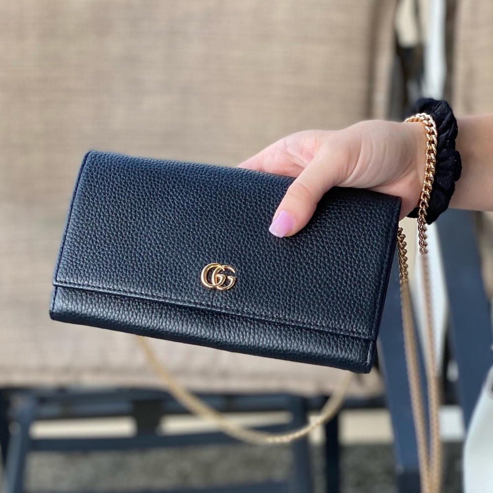New, unused black leather Gucci with gold chain. Gift bag/ gift box, bag, cert.